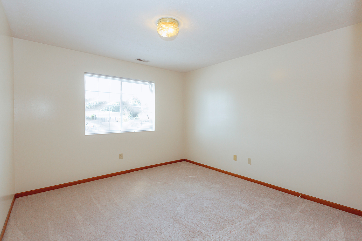 Bedroom 2 interior in Sunburst Floorplan: 2 bedroom 972 sq ft