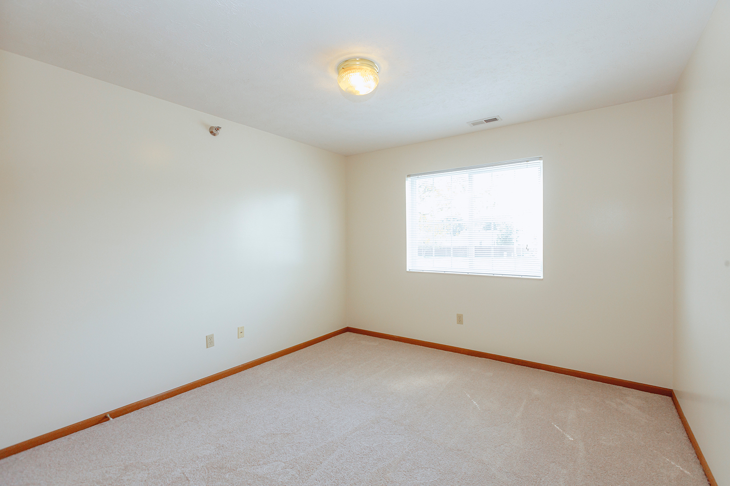 Bedroom 2 interior in Sunburst Floorplan: 2 bedroom 972 sq ft