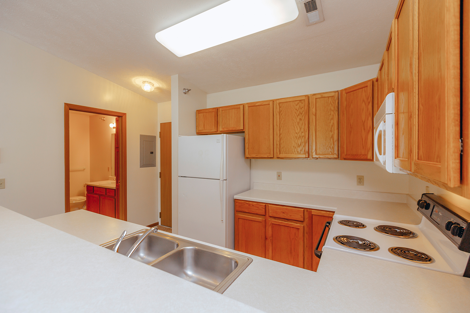 Kitchen interior of Sunset Floorplan: 1 bedroom with den