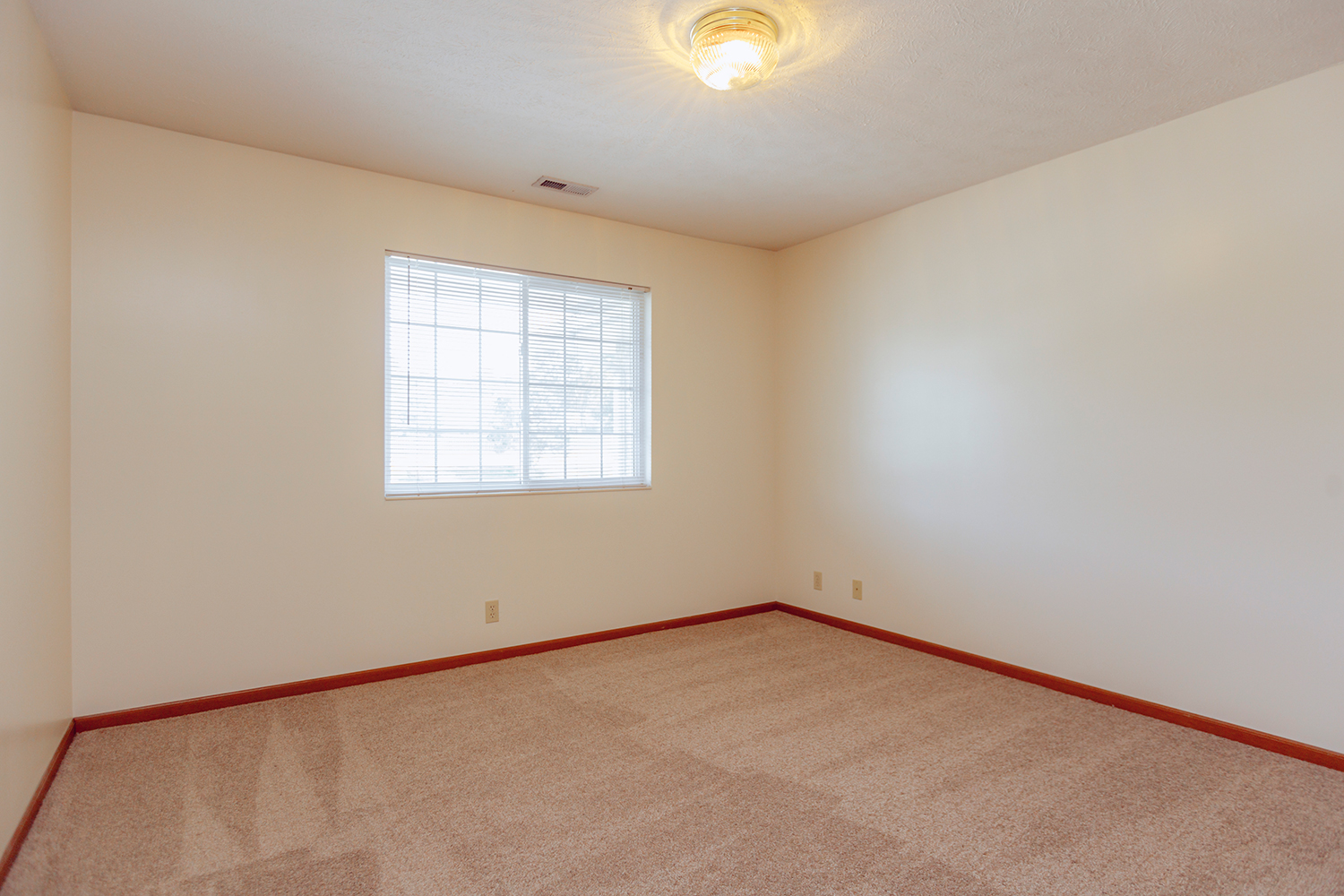 Bedroom interior of Sunset Floorplan: 1 bedroom with den